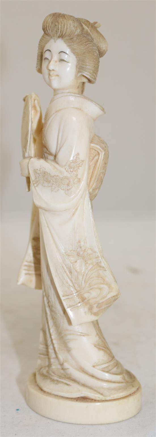 A Japanese ivory figure of a bijin, early 20th century, 19.7cm